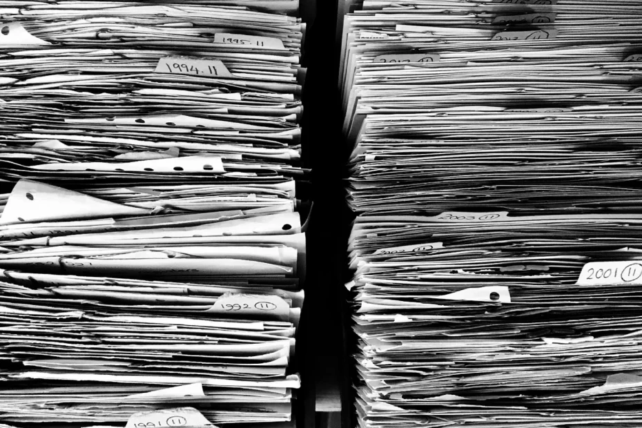 Stack of papers representing the tasks micro business owners must do.